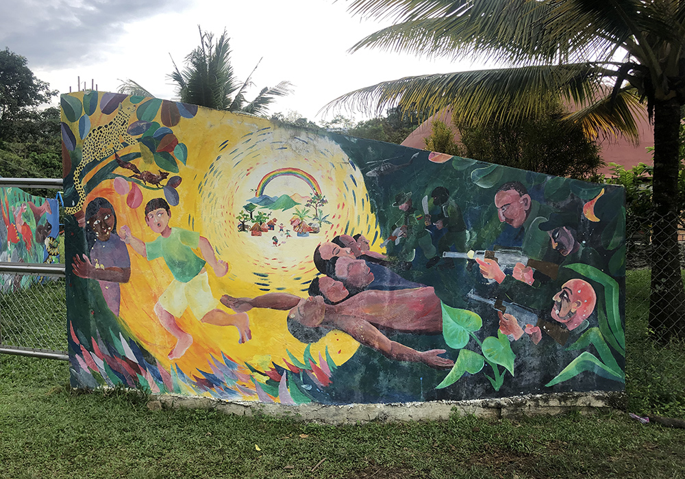 Murals surround the Peace Community of San José de Apartadó. (Tracy L. Barnett)
