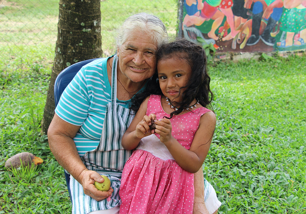 Brígida González is pictured with her granddaughter, Evelyn, at the Peace Community of San José de Apartadó, Colombia. (Tracy L. Barnett)