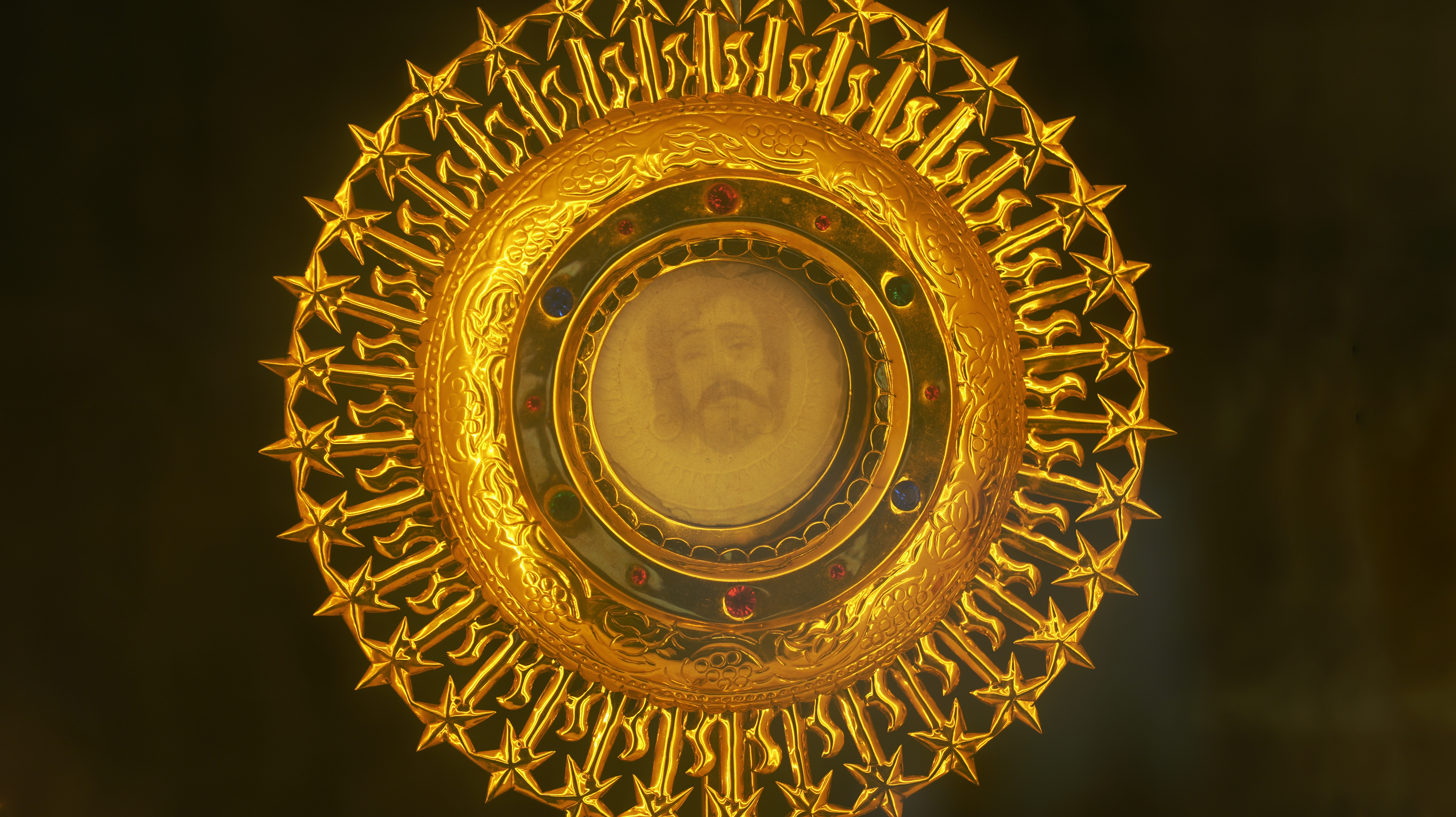 A picture of a face — believed to be Jesus — appeared on a eucharistic host in the village of Vilakkannur, India, in 2013. (Lismy Parayil)