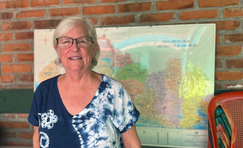 Leslie Schuld Leslie Schuld poses for a photo July 29, 2025 at the Center for Exchange and Solidarity, a nonprofit she cofounded in San Salvador, El Salvador. Schuld worries that a new foreign agent law in El Salvador will target nonprofits like hers, which receives money from Catholic parishes in the U.S. and Canada, because it has spoken up for human rights. (GSR/Rhina Guidos)