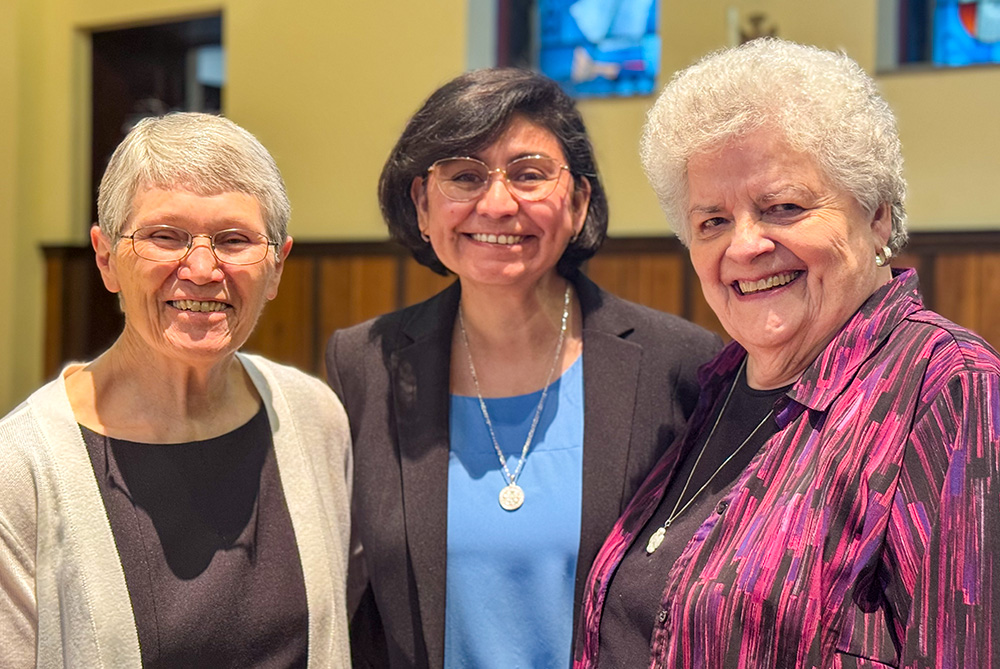 From left: Benedictine Srs. Helen Mueting, Helga Leija and Esther Fangman on the day of Leija's profession of vows. Leija wore a brand new suit found among the donations at the "R" store. (Courtesy of Helga Leija)