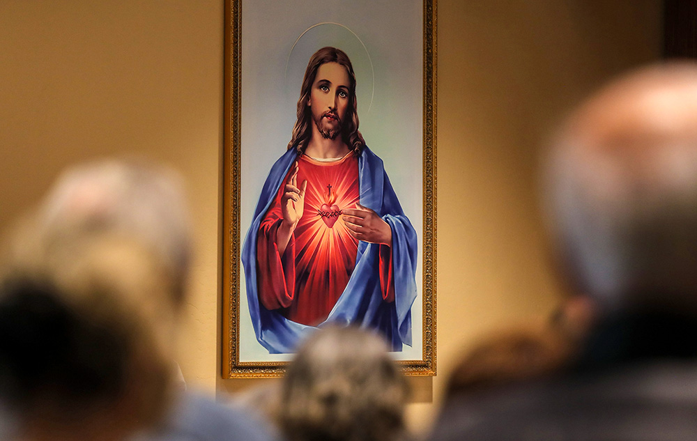 A painting of the Sacred Heart of Jesus is seen during Palm Sunday Mass at Sacred Heart Church in Prescott, Ariz., April 13, 2025. (OSV News/Bob Roller)