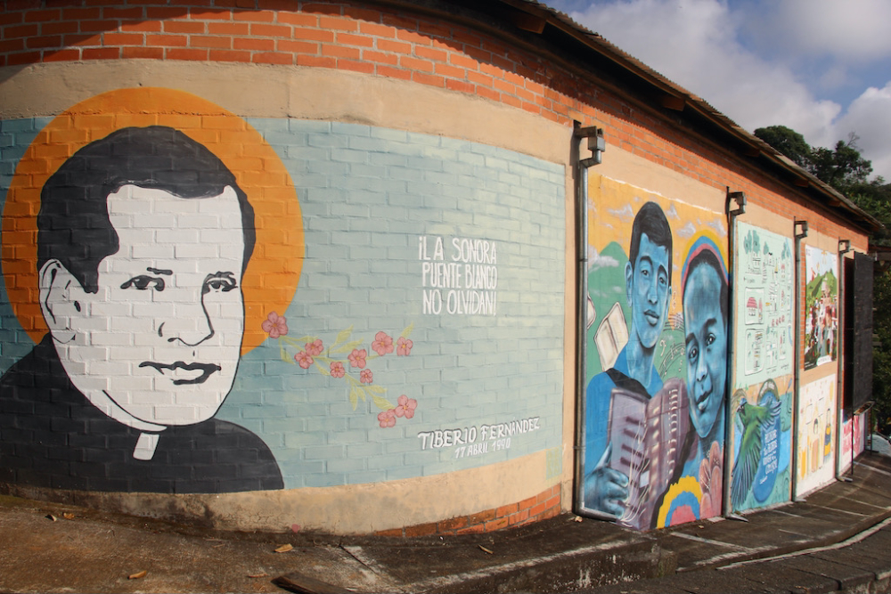 Murals throughout the complex depict Father Tiberio Fernández Mafla, the AFAVIT youth musical ensemble, and hopeful images depicting the healing process. (Tracy L. Barnett)
