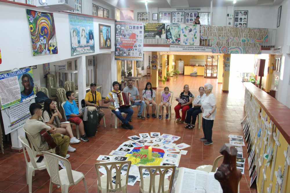 Sr. Maritze speaks to the Afavit Youth Ensemble and members of Afavit in a moving ceremony for memory and life. (Tracy L. Barnett)