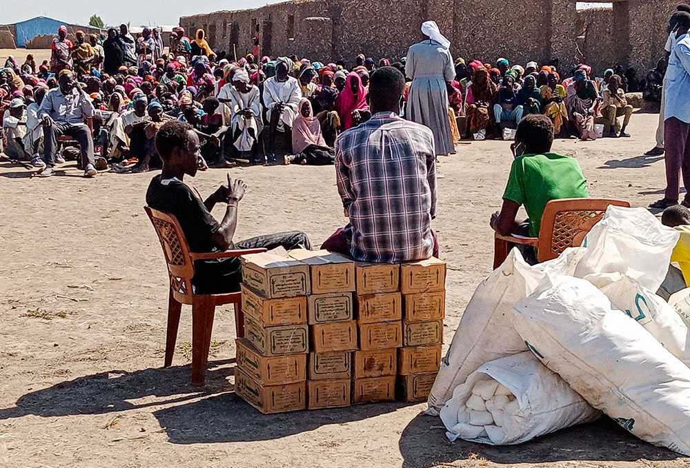 Refugees gather for aid distribution in White Nile State, Sudan, as Catholic sisters coordinate the delivery of essential supplies to families uprooted by war. (Courtesy of Sisters of the Sacred Heart of Jesus)