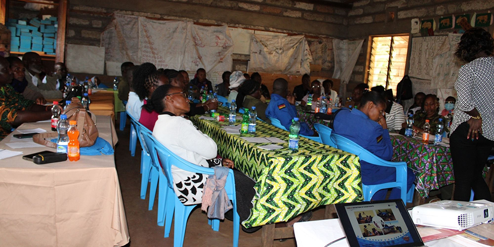 A gender-based violence meeting is pictured, organized by the Safe Space gender-based violence officer of Meru County. Safe Space, a group that brings together community stakeholders to help with advocacy, includes the area chief, various health care professionals, police officers from the gender-based violence department, teachers and the Good Shepherd Sisters. (Courtesy of Doreen Mukami)