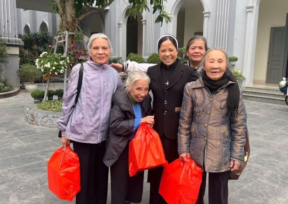 Sr. Nguyen Thi Son and others attend the Lunar New Year 2025 celebration with the Lovers of the Holy Cross sisters at the motherhouse in Hanoi. (Courtesy of LHC sisters)