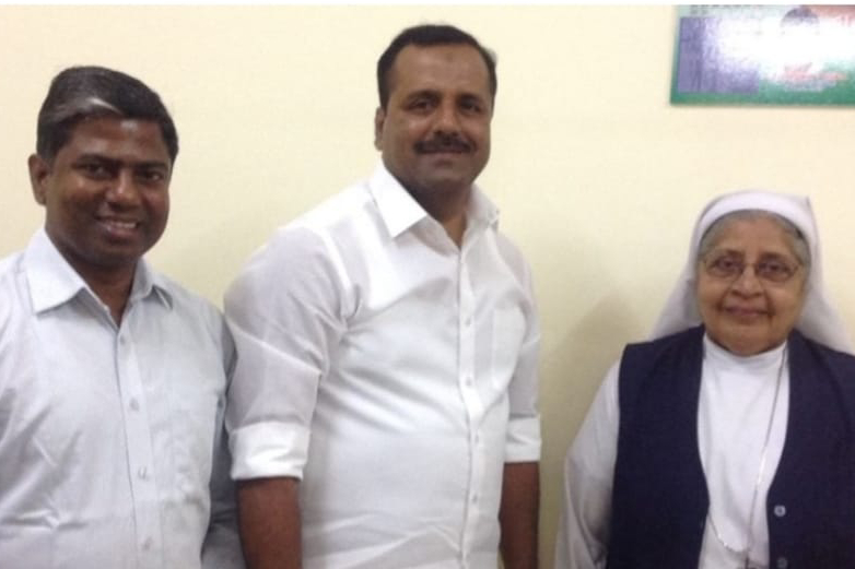 St. Joseph's of Tarbes Sr. Mary Mascarenhas with U.T. Khader (center), health minister of Karnataka state in 2015. He worked with the nuns to employ over 100 leprosy-cured persons in government service. (Courtesy of Sr. Mary Mascarenhas) St. Joseph's of Tarbes Sr. Mary Mascarenhas with U.T. Khader (center), health minister of Karnataka state in 2015. He worked with the nuns to employ over 100 leprosy-cured persons in government service. (Courtesy of Sr. Mary Mascarenhas)