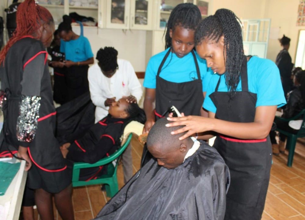 Hairdressing and beauty therapy students participate in a lesson. Hairdressing and beauty therapy students participate in a lesson.