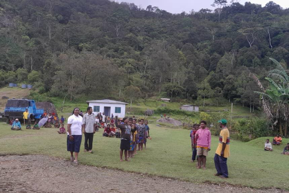 Sr. Shiny, a nurse, visits patients at one of the Cluny sisters' health clinics in Papua New Guinea. Electricity and water access are not always available, and the mountainous environment makes it difficult for people far from the clinic to access services. (Courtesy of Sylvian Aua) Sr. Shiny, a nurse, visits patients at one of the Cluny sisters' health clinics in Papua New Guinea. Electricity and water access are not always available, and the mountainous environment makes it difficult for people far from the clinic to access services. (Courtesy of Sylvian Aua)