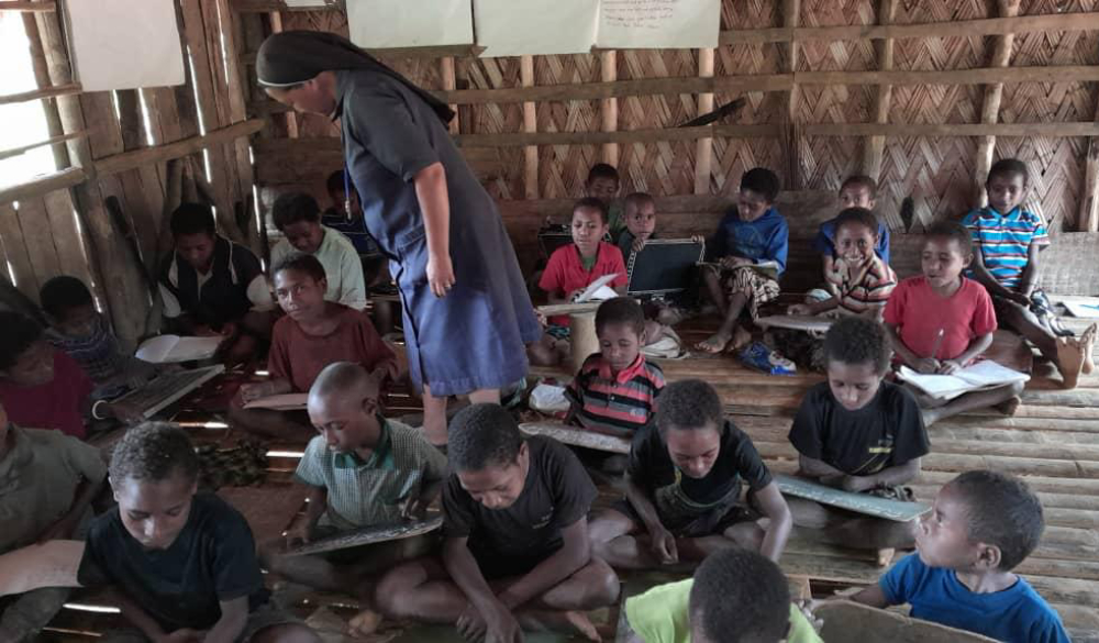 The Cluny sisters offer literacy and education programs for local children in Papua New Guinea. Education was unavailable when the sisters first arrived, so they started a school. Once the students were ready, they were trained as teachers, and they now teach in the 12 schools. (Courtesy of Sylvian Aua) The Cluny sisters offer literacy and education programs for local children in Papua New Guinea. Education was unavailable when the sisters first arrived, so they started a school. Once the students were ready, they were trained as teachers, and they now teach in the 12 schools. (Courtesy of Sylvian Aua)