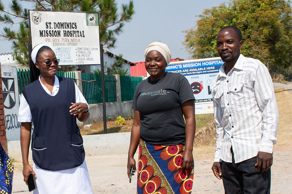 From left: Sr. Maureen Mofu, and Roiness and Aaron Chimfwembe at St. Dominic's Mission Hospital in Ndola, Zambia. The Chimfwembes participate in the SMART Couples Methodology program, facilitated by the Dominican Sisters of the Sacred Heart under the Ndola Diocese. (GSR photo/Derrick Silimina)