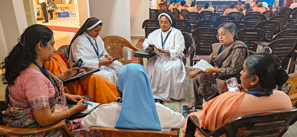 The participants discuss integration of mental health practices into various ministries in their regional groups during the Oct. 10-11, 2025, mental health conference at Changanacherry, a town in the southwestern Indian state of Kerala. (Thomas Scaria)