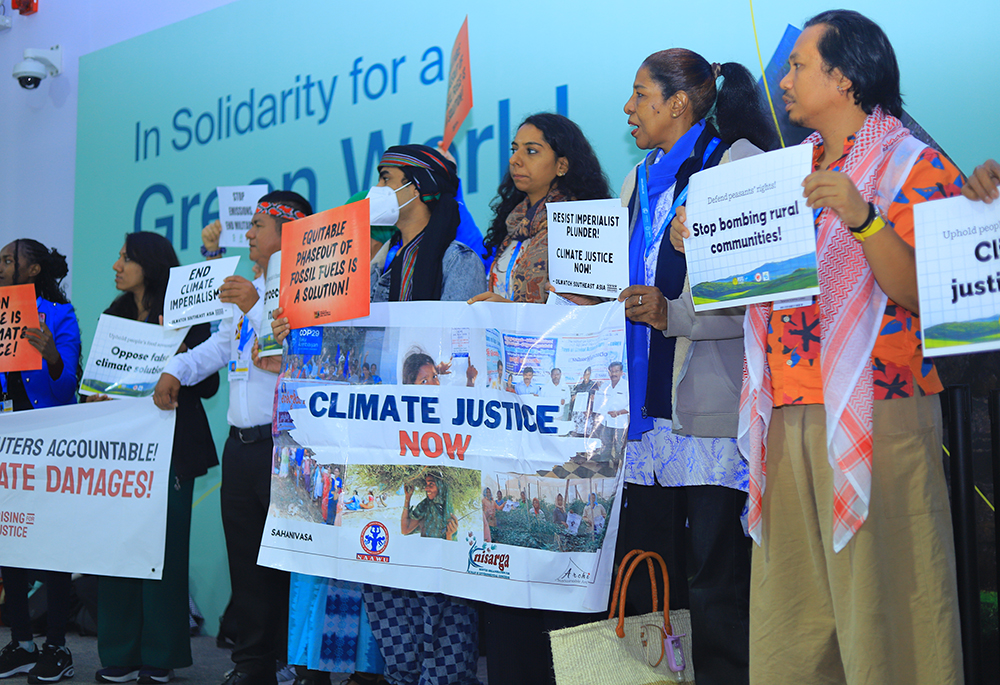 Climate activists, including religious leaders, demonstrate at the COP29 U.N. climate summit held in Baku, Azerbaijan, on Nov. 16, 2024. Belém, Brazil, near the edge of the Amazon rainforest, plays host to the COP30 United Nations climate change conference Nov. 10-21, 2025. (NCR photo/Doreen Ajiambo)