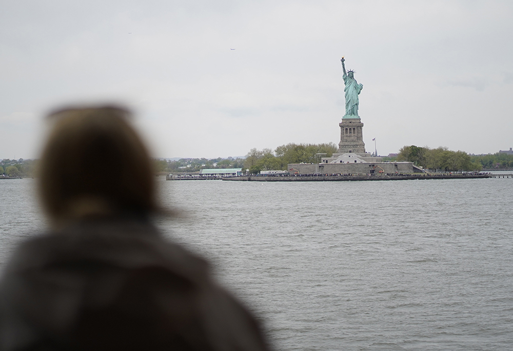 The Statue of Liberty is seen from the deck of the Dorothy Day ferry boat during its maiden voyage from Staten Island, New York, to the Manhattan borough of New York City April 28, 2023. The vessel in the Staten Island Ferry fleet is named for the co-founder of the Catholic Worker Movement. (OSV News/Gregory A. Shemitz)