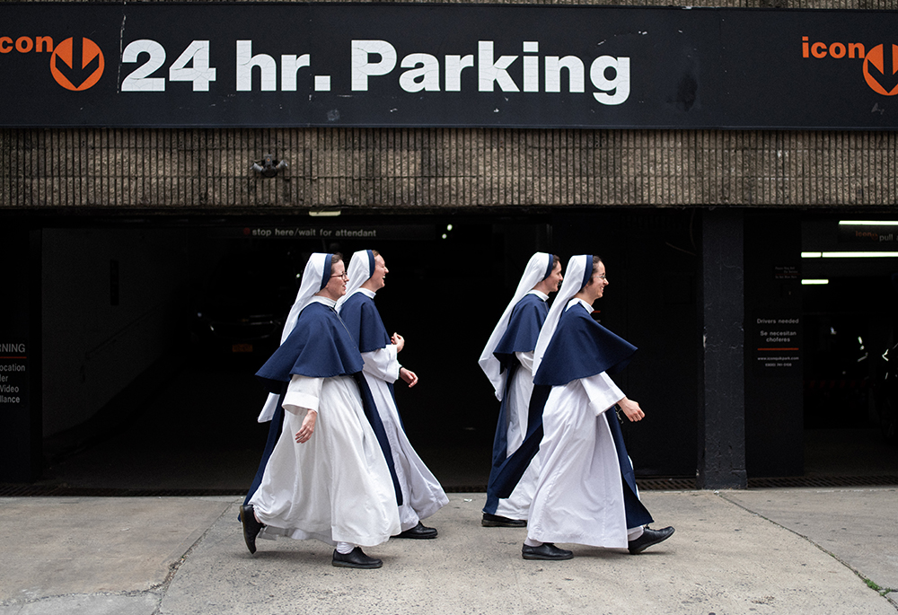 The Sisters of Life walk through the streets of New York City. The sisters welcome pregnant women and their new babies into her congregation's convent. The Holy Respite mission opened its doors in 1999 and has been a safe home for hundreds of pregnant women. (Courtesy of Sr. Catherine Joy Marie)
