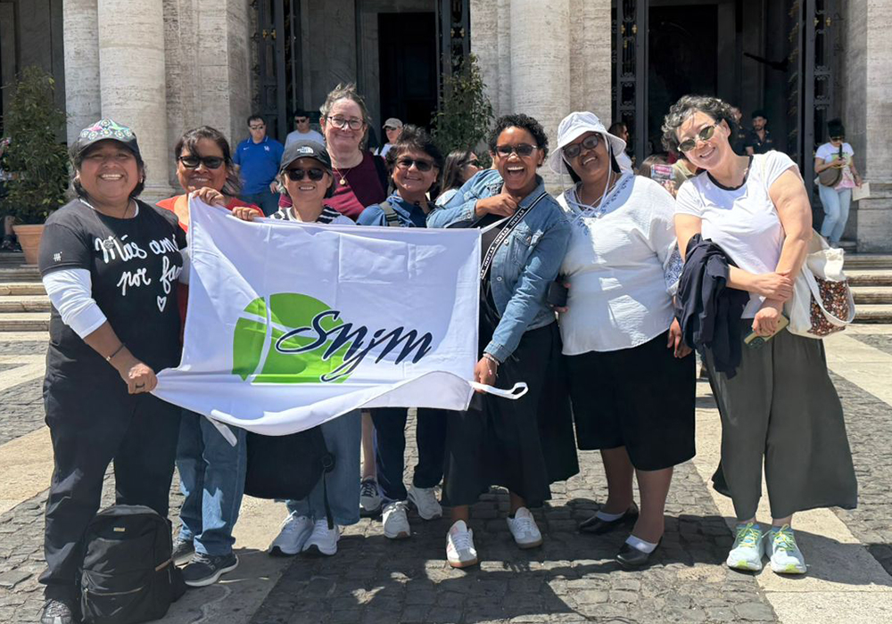 From left: Srs. Ana Maria Vilca, Yenny Chipana, Yurita Son, with Carol Haggings slightly behind, followed by Lourdes Quintana Cortavitarte, Lydia Lerato Rankoti, Berlina Mokhokhoba and Sophia Park pose at the Basilica di Santa Maria Maggiore May 28, 2025, in Rome. (Courtesy of Sophia Park)