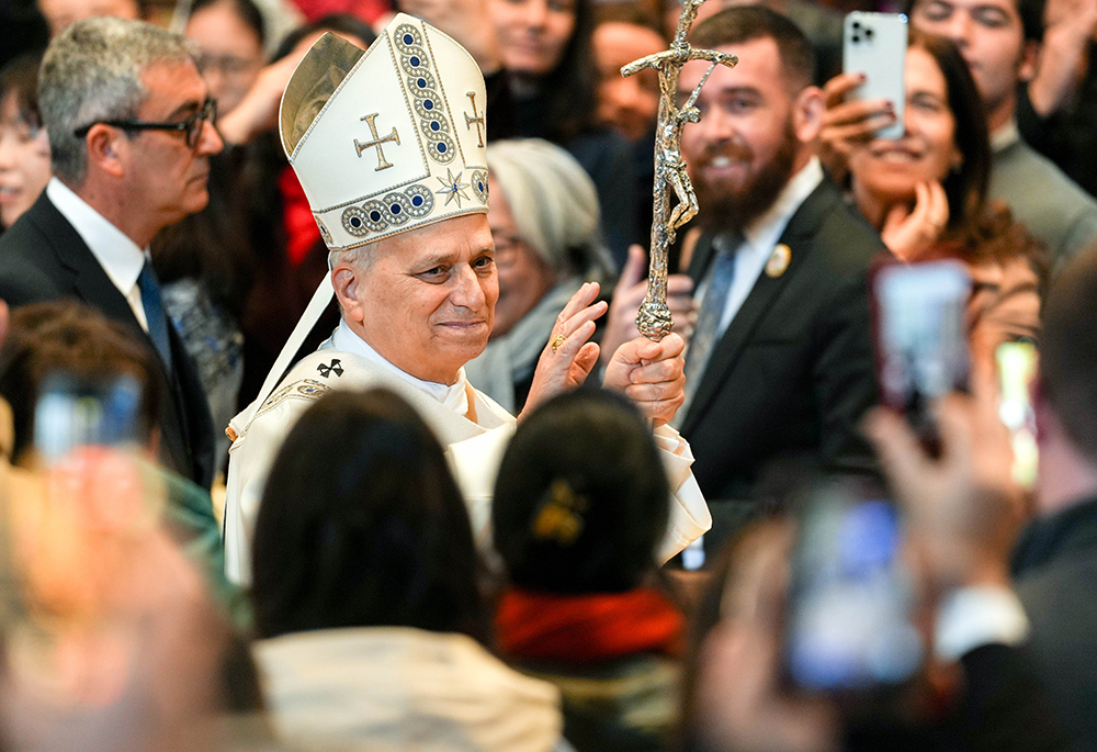 Pope Leo XIV blesses the faithful after celebrating Mass on the feast of Mary, Mother of God, and World Peace Day in St. Peter’s Basilica at the Vatican Jan. 1, 2026. (CNS/Lola Gomez)