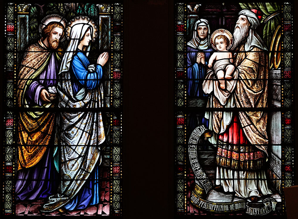 The presentation of Jesus in the Temple 40 days after his birth is depicted in stained-glass windows at Our Holy Redeemer Church in Freeport, N.Y. The feast of the Presentation of the Lord, also known as Candlemas, is celebrated Feb. 2. (OSV News/Gregory A. Shemitz)