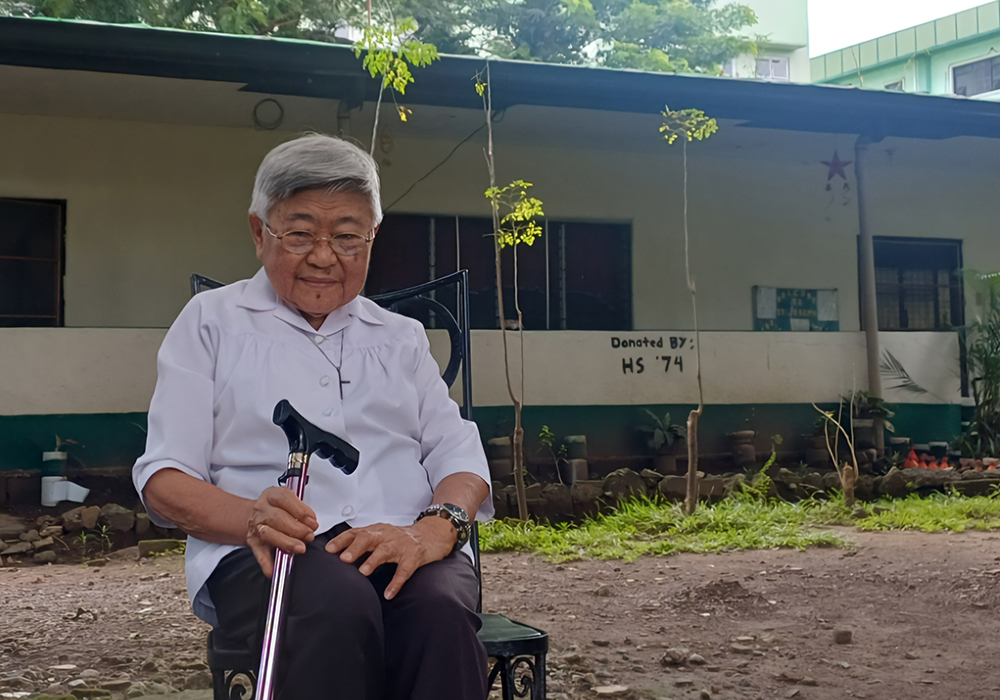 Sr. Clarita Dolencio, 91, cares for guests in a shelter she fondly calls "the train" — a place within her convent in Quezon City, Philippines, that accommodates patients and their companions from distant provinces. (Oliver Samson)