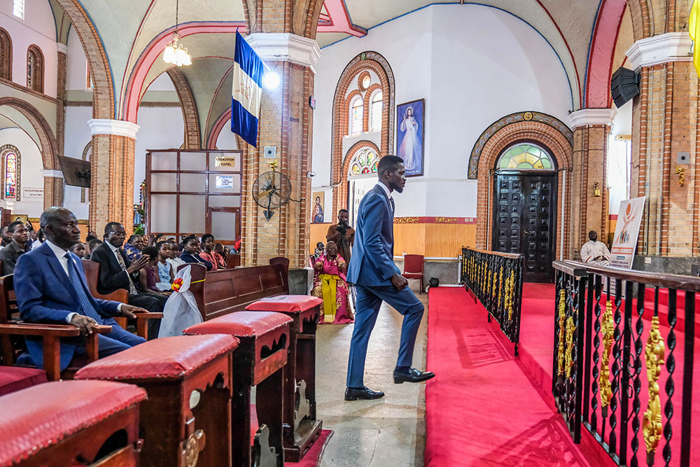Uganda's leading opposition presidential candidate, Bobi Wine, attends a church service at the Rubaga Catholic Cathedral in Kampala, Uganda, Jan. 1, 2026. (AP/Hajarah Nalwadda)