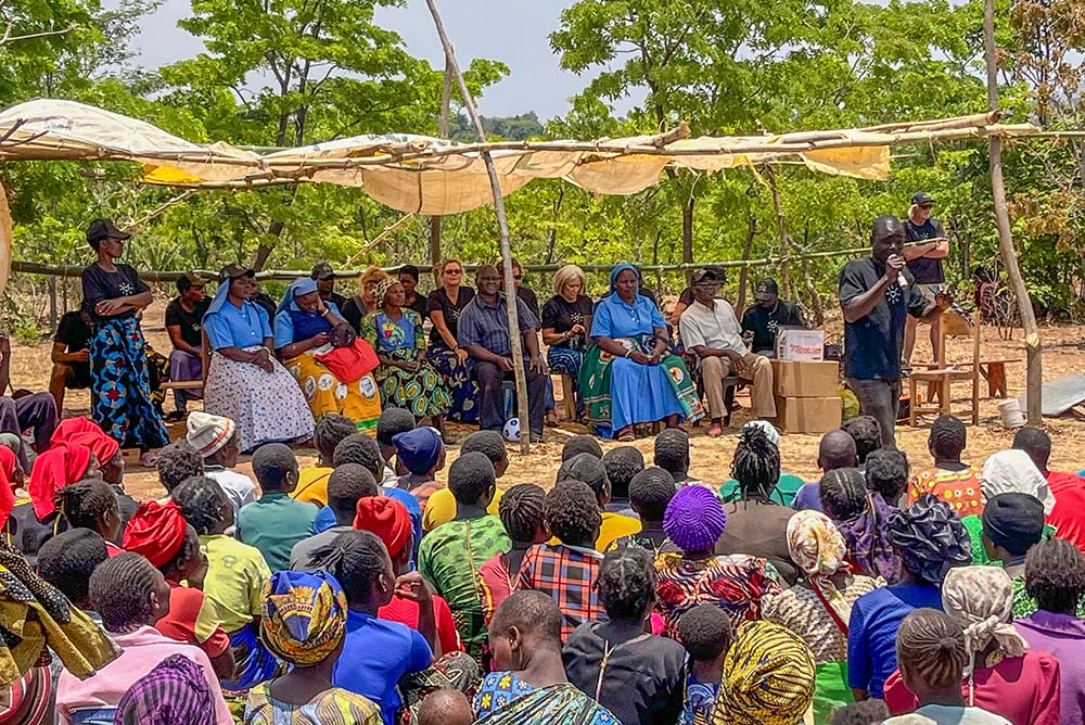 Village chiefs, community-based Watts of Love trainers and travelers participate in the distribution of solar lights and financial literacy education during a four-day training session at Mponela Lodge in Malawi in October 2025. (Courtesy of Watts of Love)
