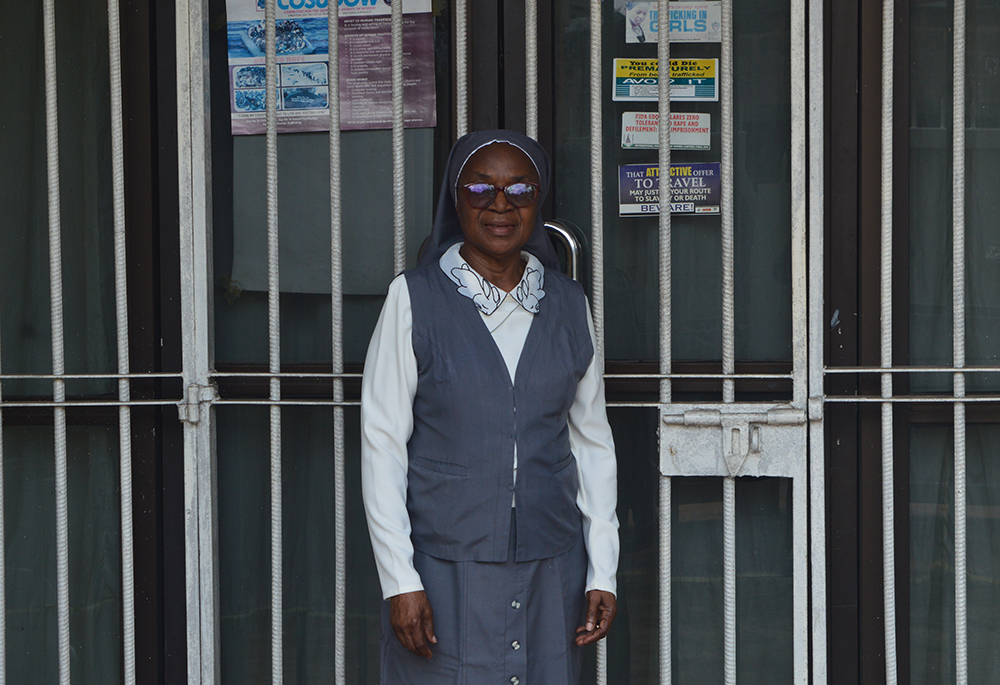 Sr. Anthonia Ibeh, a member of the Medical Missionaries of Mary, is pictured outside the sisters' convent in Benin City, Nigeria. (Valentine Benjamin)