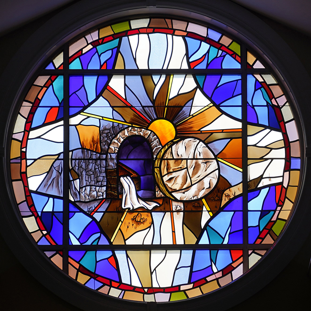 Christ's tomb is depicted in a stained-glass window at St. Patrick Church in Smithtown, New York. (OSV News/Gregory A. Shemitz)