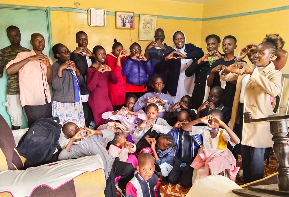 Sr. Josephine Adhiambo (back row in habit), a member of the Franciscan Sisters of St. Anne, participates in a sign language class in Nakuru, Kenya. (Shadrack Omuka)