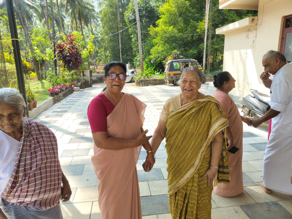 Nazareth Sr. Nisha Chemmanam welcomes Annamma George Periyampuram to Asa Nilayam Pakal Veedu (Abode of Hope Day Home), a center for the elderly at Kallanode, Kozhikode district, Kerala, southwestern India. (George Kommattam)
