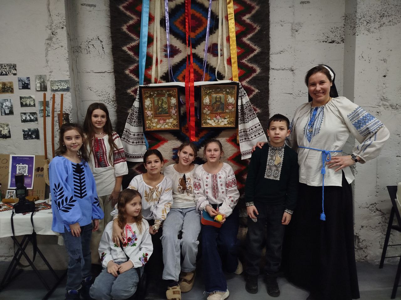 Basilian Sr. Yelysaveta Varnitska poses with children from the catechetical school at a vechornytsi evening gathering in Zaporizhzhia, Ukraine. (Courtesy of Anhelina Yaroshenko)