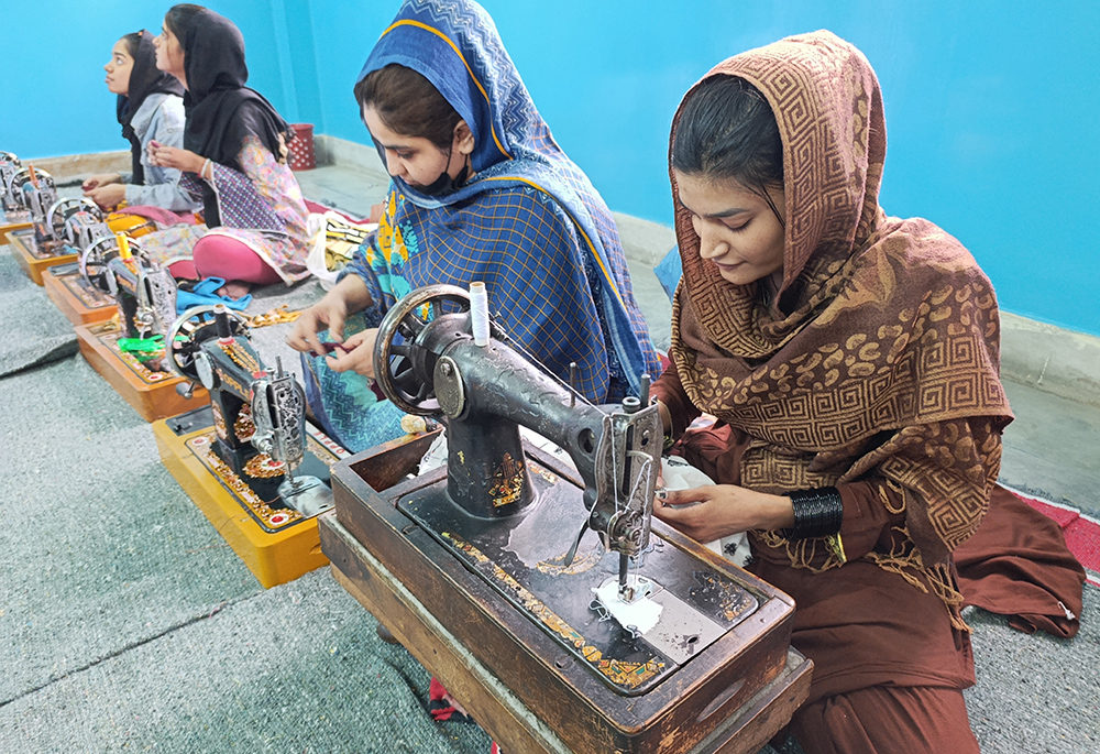 A group of trainees are pictured at the sewing center run by the Franciscan Tertiary Sisters of Lahore. (Kamran Chaudry)