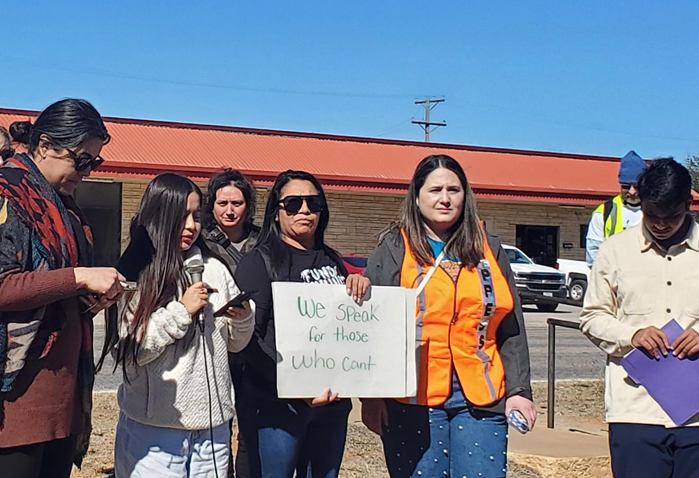 Around 350 people gathered in a park in Dilley, Texas, on Jan. 28, 2026, for a vigil and procession to South Texas Family Residential Center. (Courtesy of Martha Ann Kirk)