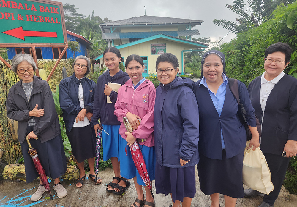 Sr. Flora Nirmala, second from right, the unit leader of Good Shepherd Social Services in Ruteng, Indonesia, poses with other members of her Good Shepherd community. (GSR/Chris Herlinger)