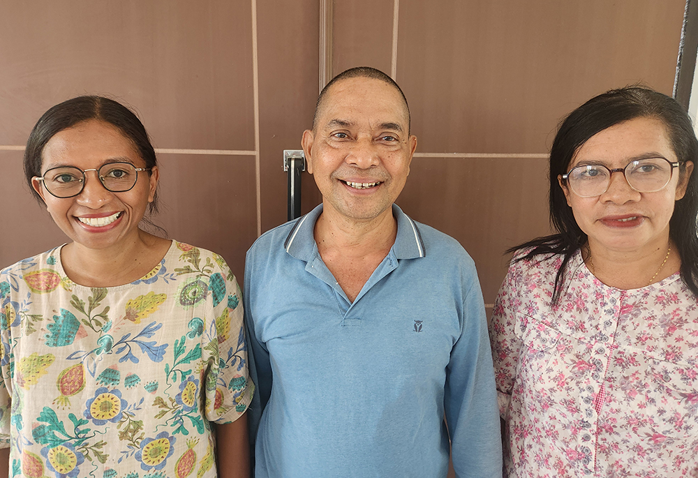 Staff and volunteers at TRUK F, or the Flores Humanitarian Volunteer Team, are pictured. From left to right are staff attorney Elisabeth Bestyana, volunteer lawyer Falentinus Pogon and staff member Yosephina Dafrosa. (GSR/Chris Herlinger)