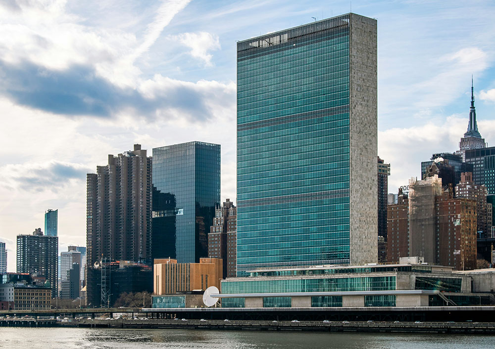 The United Nations headquarters in New York City, the site of the 70th session of the U.N.'s Commission on the Status of Women, which met March 9-19, 2026 (Unsplash/Zoshua Colah)