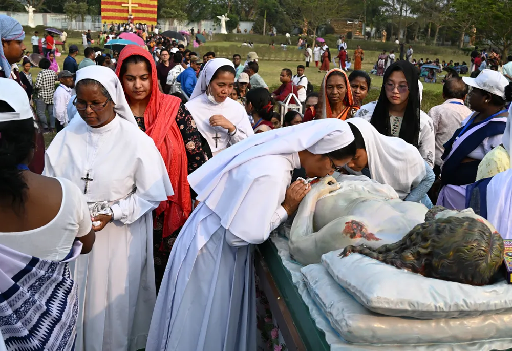 A group of the Missionary Sisters of Mary Help of Christians attends the Way of the Cross at the Basilica of the Holy Rosary, Bandel, West Bengal. (Fr. John Chalil)