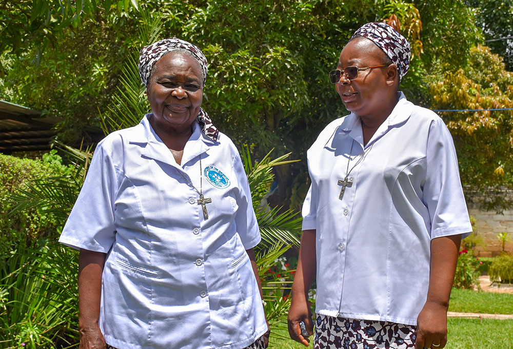 Sr. Rose Nyondo, the program director for the Community Transformation Programme, and project coordinator Sr. Matilda Mubanga. The program, run by the Daughters of the Redeemer, promotes agricultural productivity in Chibombo and other areas in Zambia. (Derrick Silimina)