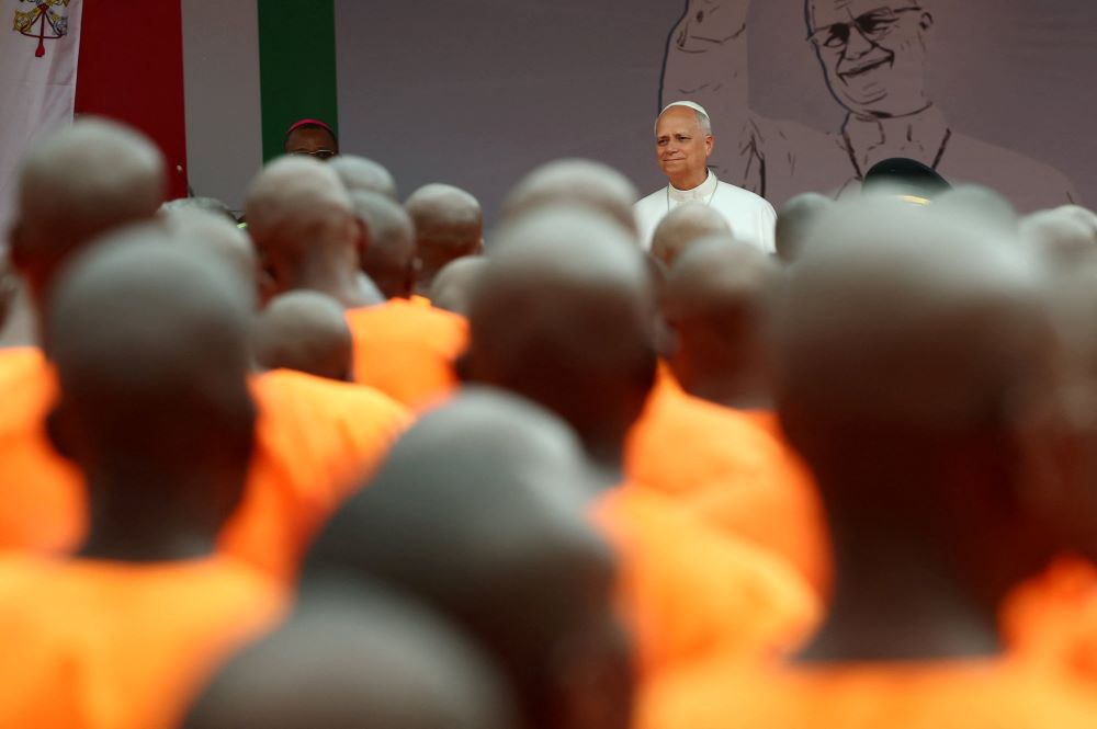 Pope Leo XIV smiles as inmates look on during his visit to Bata prison in Equatorial Guinea April 22, 2026. (OSV News/Reuters/Kevin Thoma)