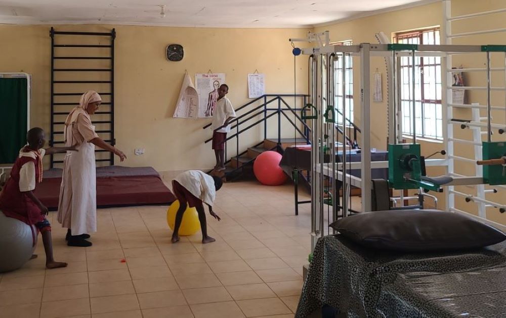 Sr. Roslin Thalakkotture works with children during a physiotherapy session at the Divine Providence Home in Isiolo, Kenya. (Mourine Achieng)