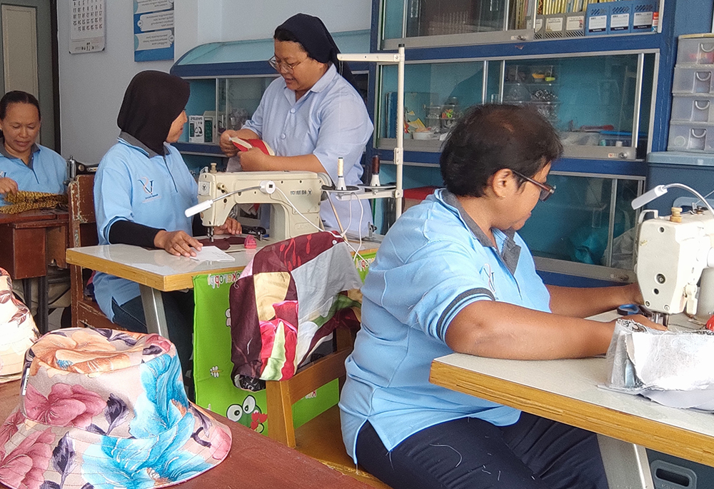 Sr. Cicilia Indrayani of the Daughters of Charity teaches women how to sew and helps prepare them for the garment industry in the region. (Courtesy of the Daughters of Charity)