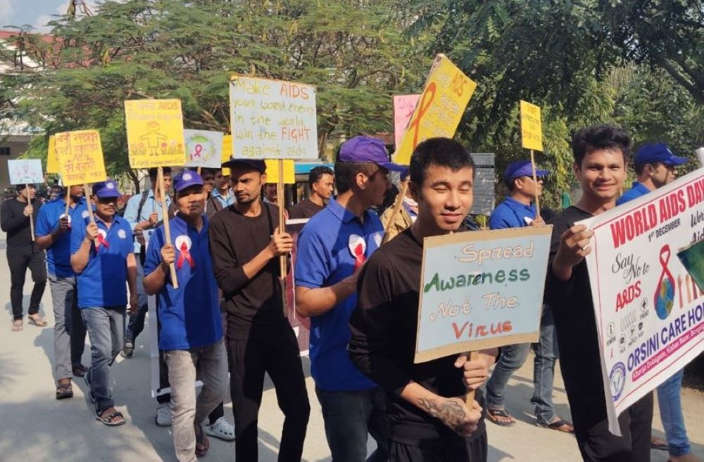 Residents of the Orsini Care Home at Bongaigaon, Assam state in northeastern India, participate in an HIV/AIDS awareness rally on Dec. 1, 2025, World HIV/AIDS Day. (Courtesy of Merin Lukose)