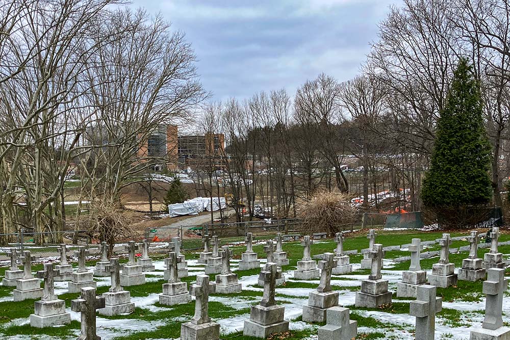 The EcoVillage construction site is visible from the Sisters of Divine Providence's cemetery. The EcoVillage's lead contractor and its land manager both said they're moved by the history of the many women who lived and worked here. (Jennifer Szweda Jordan)