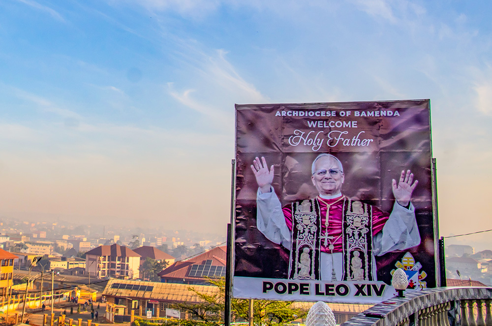 A roadside billboard welcomes Holy Father Pope Leo XIV to Bamenda, Cameroon, April 14, 2026. (AP/Welba Yamo Pascal)