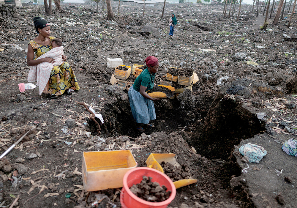 An internally displaced woman, who said she could not return home because it was destroyed during fighting, gathers volcanic gravel to sell at a camp in the Mugunga district, near Goma, in eastern Congo, March 22, 2025. The camp was emptied after M23 rebels ordered many displaced people to leave it and other camps. (OSV photo/Reuters/Zohra Bensemra)