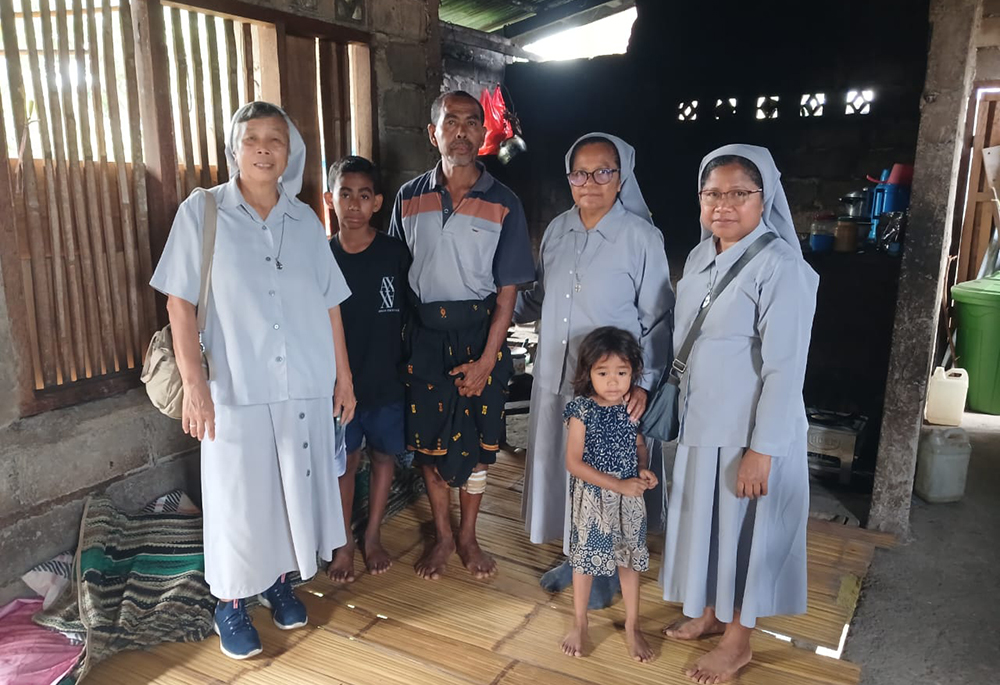 Members of the Franciscan Missionaries of Mary responded to 2023 floods in the village of Mauponggo, about a two hours' drive south of Soa on the island of Flores, Indonesia, where a group of the sisters reside. (Courtesy of the Franciscan Missionaries of Mary)