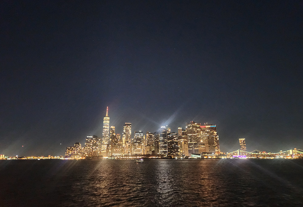 On a recent visit to New York City, a group of Ukrainian Sisters of the Order of St. Basil the Great journeyed from Manhattan to the borough of Staten Island on the ferry. On the return to Manhattan, the lights of lower Manhattan were visible. (GSR/Chris Herlinger)