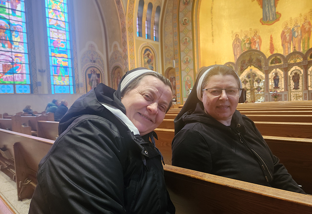 Mother Sevastiana Karvatska, right, the provincial superior of the Sisters of the Order of St. Basil the Great in Ukraine, seen here with Sr. Lucia Murashko following an interview at St. George Ukrainian Catholic Church in Manhattan's East Village during a recent visit to New York City. (GSR/Chris Herlinger)