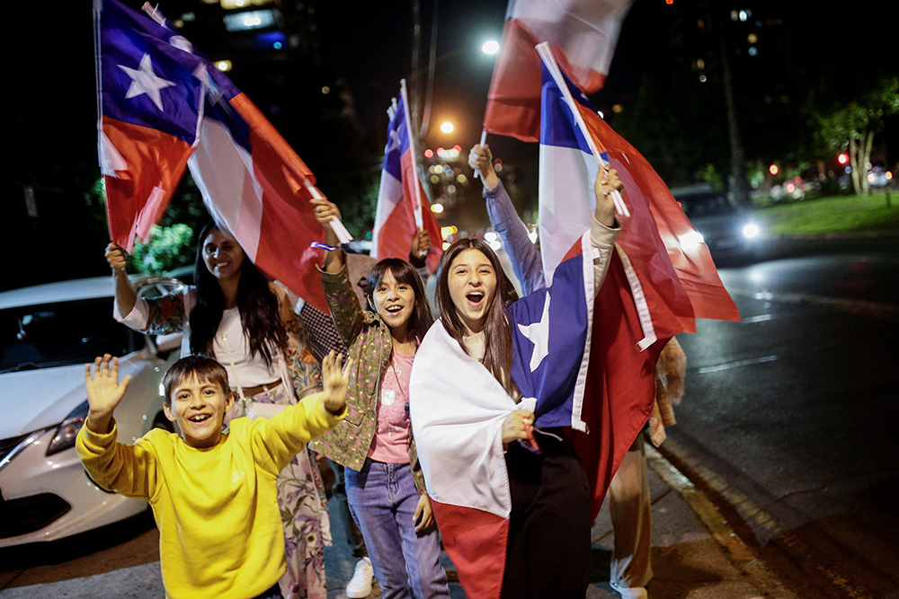 Supporters of José Antonio Kast, a member of the far-right Republican Party of Chile, celebrate after Kast won the presidential runoff election in Santiago Dec. 14, 2025. (OSV News/Reuters/Juan Gonzalez)