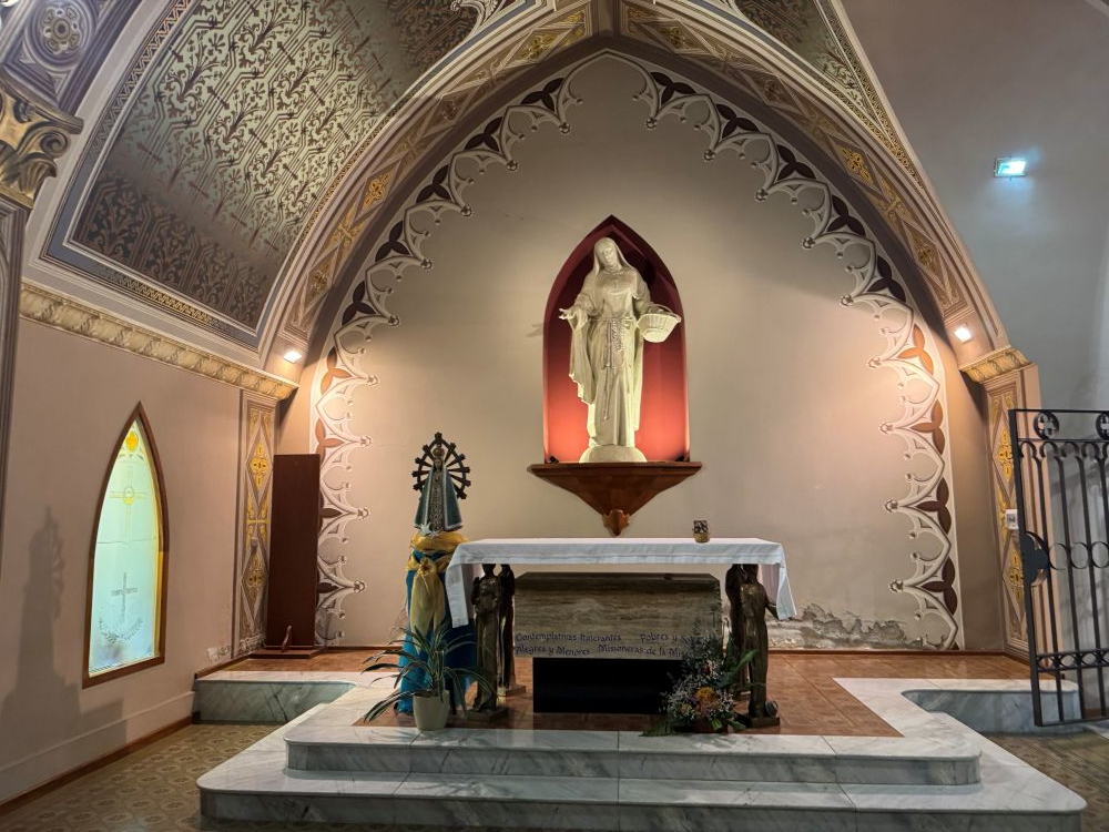 A marble sculpture depicting Blessed María del Tránsito Cabanillas with her little basket stands at a shrine at the motherhouse of the Franciscan Tertiary Missionary Sisters in Córdoba, Argentina. (GSR photo/Helga Leija)